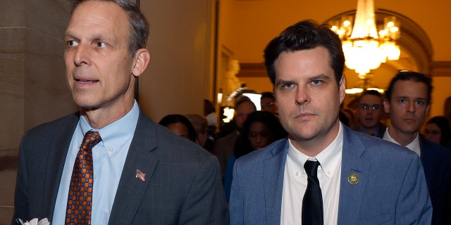 WASHINGTON, DC - JANUARY 04: U.S. Rep.-elect Scott Perry, R-Penn., left, and Rep.-elect Matt Gaetz, R-Fla., right, leave the House Chamber at the U.S. Capitol Building on January 04, 2023, in Washington, DC.