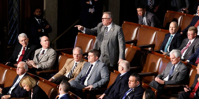 Rep.-elect Mike Bost , R-Ill., yells out as Rep.-elect Matt Gaetz, R-Fla., delivers remarks in the House Chamber during the fourth day of elections for speaker of the House at the U.S. Capitol Building in Washington, D.C., on Friday.