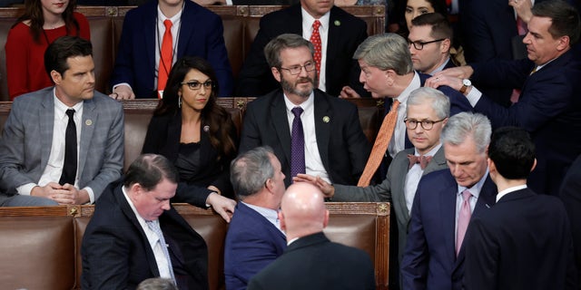 FILE: U.S. Rep.-elect Mike Rogers, R-Ala., is restrained by Rep.-elect Richard Hudson, R-N.C., after getting into an argument with Rep.-elect Matt Gaetz, R-Fla., as House Republican Leader Kevin McCarthy, R-Calif., walks away, in the House Chamber during the fourth day of elections for Speaker of the House at the U.S. Capitol Building on January 06, 2023 in Washington, DC.