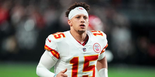 Patrick Mahomes of the Kansas City Chiefs runs off the field after the first half against the Las Vegas Raiders at Allegiant Stadium on January 7, 2023 in Las Vegas. 