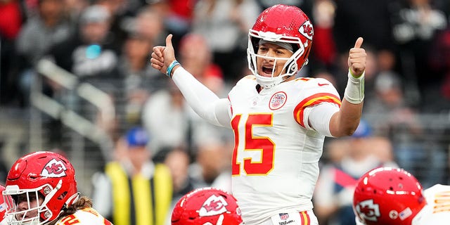 Patrick Mahomes #15 of the Kansas City Chiefs signals at the line of scrimmage against the Las Vegas Raiders during the first half of the game at Allegiant Stadium on Jan. 7, 2023 in Las Vegas, Nevada. 