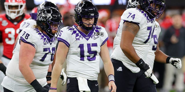 TCU Horned Frogs' Max Duggan, #15, reacts after a sack in the third quarter against the Georgia Bulldogs in the College Football Playoff National Championship game at SoFi Stadium on January 9, 2023 in Inglewood, California. 