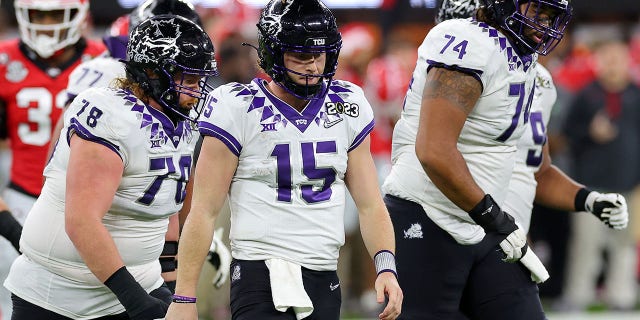 TCU Horned Frogs' Max Duggan, #15, reacts after a sack in the third quarter against the Georgia Bulldogs in the College Football Playoff National Championship game at SoFi Stadium on January 9, 2023 in Inglewood, California. 