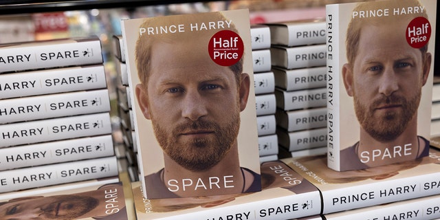 Prince Harry's book ‘Spare’ goes on display in a branch of WH Smith opposite Windsor Castle in Windsor, England, on Tuesday.