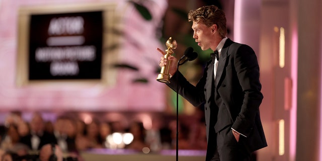 Austin Butler accepts the Best Actor in a Motion Picture – Drama award for "Elvis" onstage at the 80th Annual Golden Globe Awards held at the Beverly Hilton Hotel on Jan. 10, 2023 in Beverly Hills, California. 