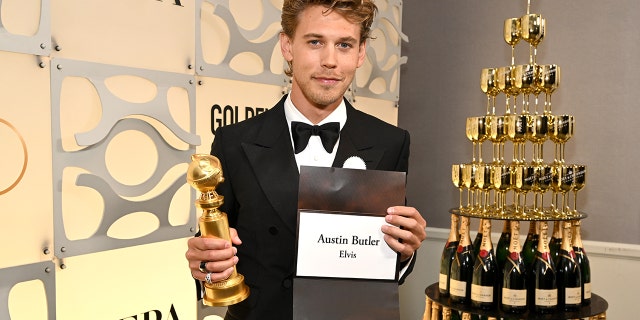 Austin Butler poses with the Best Actor in a Motion Picture – Drama award for "Elvis" at the 80th Annual Golden Globe Awards with Moët And Chandon at The Beverly Hilton on Jan. 10, 2023 in Beverly Hills, California. 