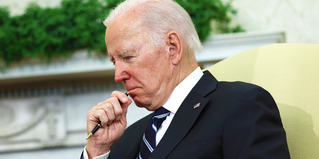 President Joe Biden is shown in the Oval Office at the White House on January 13, 2023.