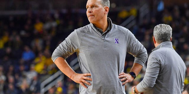 Northwestern Wildcats head basketball coach Chris Collins watches a play during the second half of a college basketball game against the Michigan Wolverines at Crisler Arena on January 15, 2023 in Ann Arbor, Michigan.  The Michigan Wolverines won the game 85-78 over the Northwestern Wildcats. 