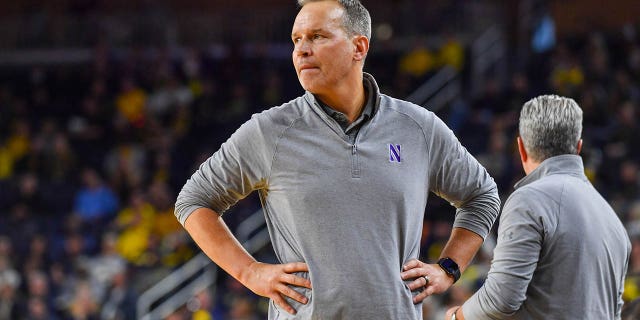 Head Basketball Coach Chris Collins of the Northwestern Wildcats watches a play during the second half of a college basketball game against the Michigan Wolverines at Crisler Arena on January 15, 2023 in Ann Arbor, Michigan. The Michigan Wolverines won the game 85-78 over the Northwestern Wildcats.