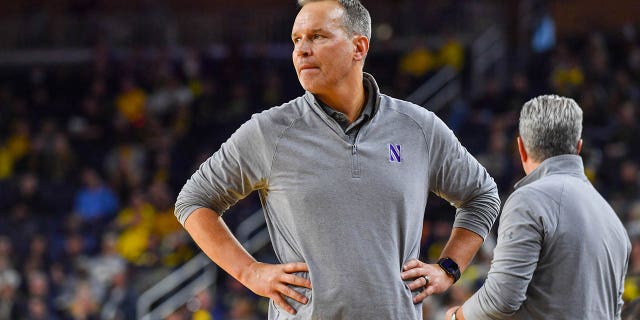 Northwestern Wildcats head basketball coach Chris Collins watches a play during the second half of a college basketball game against the Michigan Wolverines at Crisler Arena on January 15, 2023 in Ann Arbor, Michigan.  The Michigan Wolverines won the game 85-78 over the Northwestern Wildcats. 