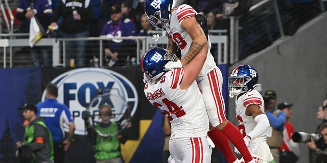 Isaiah Hodgins of the New York Giants celebrates after scoring a touchdown against the Minnesota Vikings in the NFC Wild Card Playoff game at US Bank Stadium on January 15, 2023 in Minneapolis.
