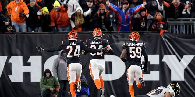 Sam Hubbard #94 of the Cincinnati Bengals scores a 98 yard touchdown off of a recovered fumble by Tyler Huntley #2 of the Baltimore Ravens during the fourth quarter in the AFC Wild Card playoff game at Paycor Stadium on January 15, 2023 in Cincinnati, Ohio. 
