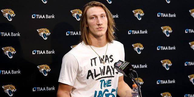Jacksonville Jaguars quarterback Trevor Lawrence speaks to the media during the post-game press conference after winning an AFC wild card game against the Los Angeles Chargers at TIAA Bank Field on January 14, 2023 in Jacksonville, Florida.