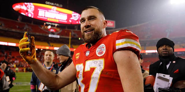 Travis Kelce of the Kansas City Chiefs celebrates after defeating the Jacksonville Jaguars in an AFC divisional playoff game at Arrowhead Stadium Jan. 21, 2023, in Kansas City, Mo. 