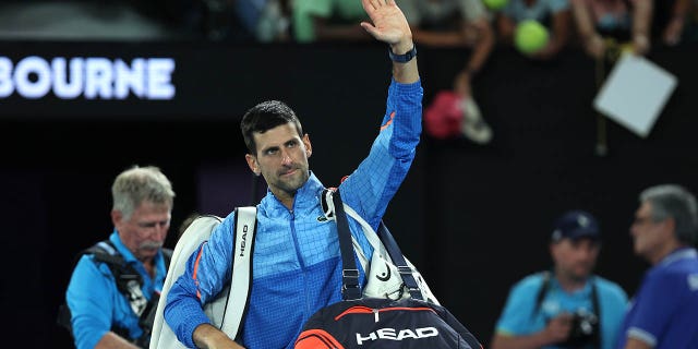 Novak Djokovic of Serbia waves to the crowd after winning in the fourth round singles match against Alex de Minaur of Australia during day eight of the 2023 Australian Open at Melbourne Park on January 23, 2023 in Melbourne, Australia.