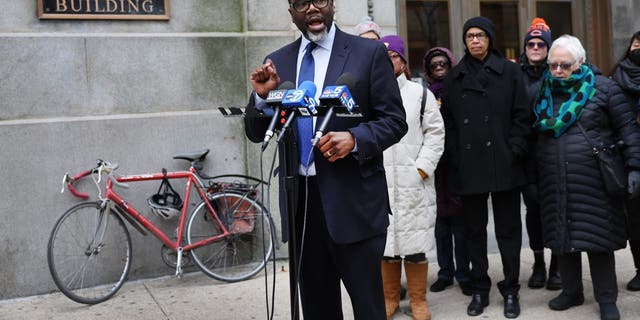Chicago mayoral candidate and Cook County commissioner Brandon Johnson speaks during a press conference outside city hall to explain his proposed agenda if elected mayor on Jan. 24, 2023, in Chicago.
