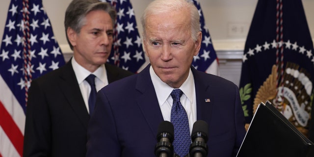 U.S. President Joe Biden and Secretary of State Antony Blinken listens in the Roosevelt Room of the White House on January 25, 2023 in Washington, DC.