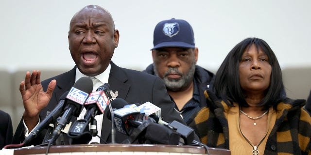 Flanked by Rodney Wells (C) and RowVaughn Wells, the stepfather and mother of Tyre Nichols, civil rights attorney Ben Crump speaks during a press conference on January 27, 2023 in Memphis, Tennessee. 