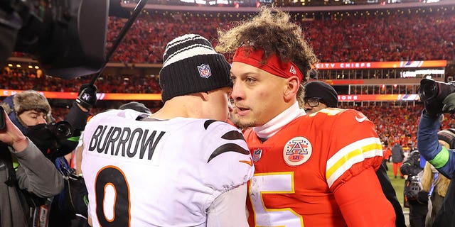 Joe Burrow #9 of the Cincinnati Bengals and Patrick Mahomes #15 of the Kansas City Chiefs meet on the field after the AFC Championship Game at GEHA Field at Arrowhead Stadium on January 29, 2023 in Kansas City, Missouri. 