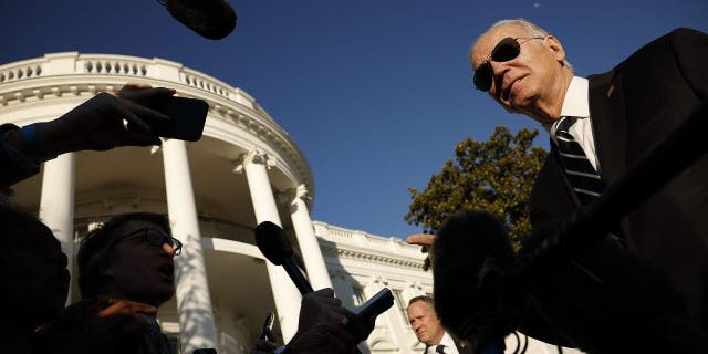 President Biden talks to reporters after returning to the White House on Jan. 30, 2023 in Washington, D.C. Biden had traveled to Baltimore to talk about how the Bipartisan Infrastructure Law's funds are slated to help replace the 150-year-old Baltimore to Potomac Tunnel.  