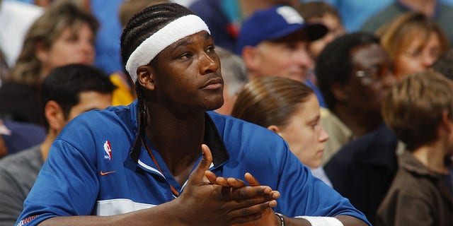 Kwame Brown of the Wizards sits on the bench during a Seattle Sonics game at MCI Center on November 12, 2002 in Washington, DC.