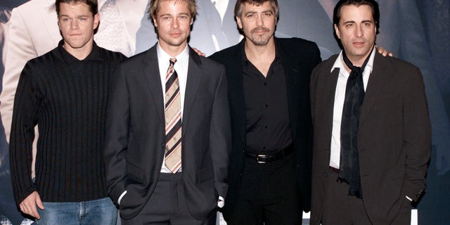 Matt Damon, Brad Pitt, George Clooney and Andy Garcia attend the London premiere of "Ocean's Eleven" in 2001.