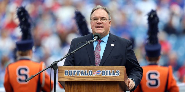 John Murphy, the voice of the Bills, speaks to the crowd before a game between the Buffalo Bills and the Miami Dolphins at Ralph Wilson Stadium on September 14, 2014 in Orchard Park, NY 
