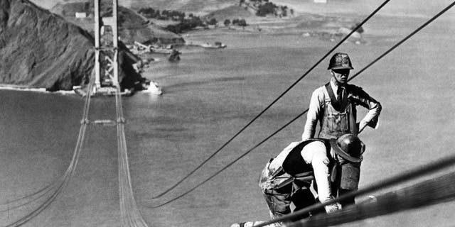 Picture dated October 1935 of the Golden Gate Bridge, in the San Francisco Bay, during construction. The construction began on January 5, 1933, and the bridge was inaugurated on May 27, 1937, by Franklin Delano Roosevelt, who pushed a button in Washington, D.C., signaling the official start of vehicle traffic over the bridge. The idea of engineer Joseph Strauss, it was the largest suspension bridge in the world.