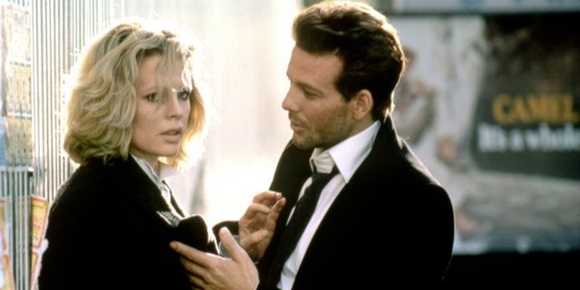 Kim Basinger and Mickey Rourke on the set of "Nine 1/2 Weeks."