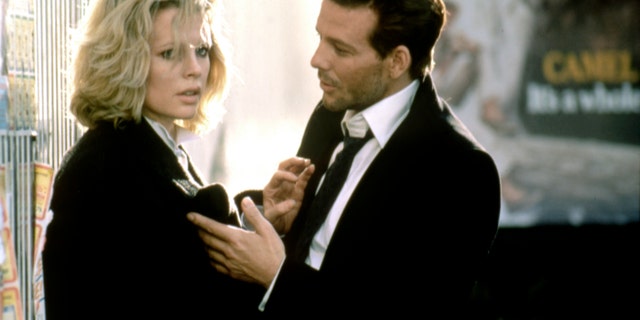 Kim Basinger and Mickey Rourke on the set of "Nine 1/2 Weeks."