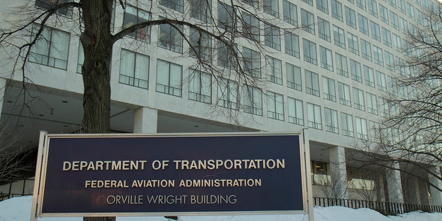 Department of Transportation sign outside the Orville Wright Building.