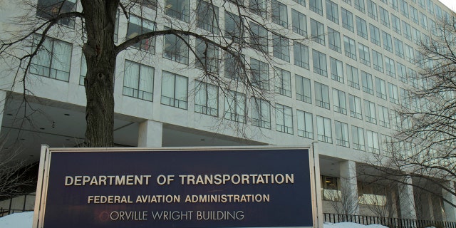 Department of Transportation sign outside the Orville Wright Building.