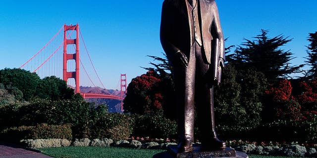 UNITED STATES - JANUARY 26: Monument to Joseph Baermann Strauss (Cincinnati, 1870-Los Angeles, 1938), chief engineer of the Golden Gate Bridge, with the bridge in the background, San Francisco, California.