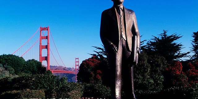 UNITED STATES - JANUARY 26: Monument to Joseph Baermann Strauss (Cincinnati, 1870-Los Angeles, 1938), chief engineer of the Golden Gate Bridge, with the bridge in the background, San Francisco, California.