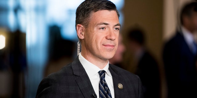 Rep. Jim Banks, R-Ind., does a television interview in the Capitol on Wednesday, Sept. 27, 2017.