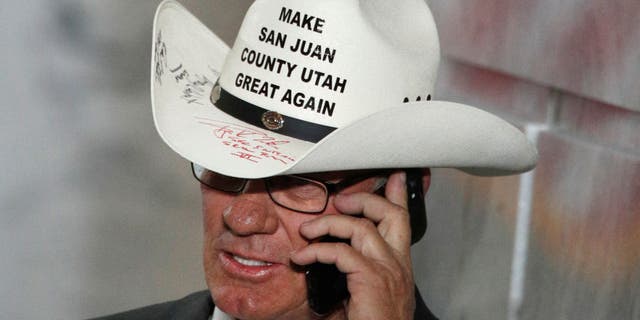 Bruce Adams, Chairman of the San Juan County Commission, talks on the phone before a event with U.S. President Donald Trump at the Rotunda of the Utah State Capitol on December 4, 2017 in Salt Lake City, Utah. (George Frey/Getty Images)