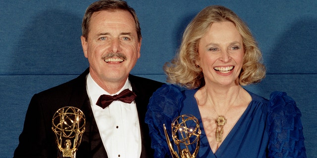 Emmy Winners and real-life husband and wife, William Daniels and Bonnie Bartlett Daniels, celebrate their Emmy Awards backstage at the Emmy Awards Show, Sept. 21, 1986 in Pasadena, California. 