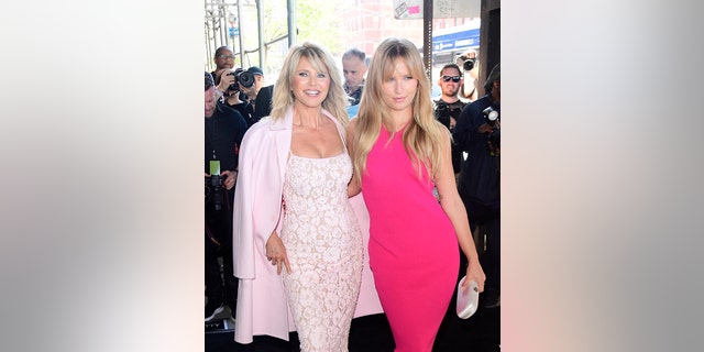 Christie Brinkley, left, and Sailor Brinkley Cook arrive at the Michael Kors Collection Spring/Summer 2023 fashion show during New York Fashion Week on September 14, 2022 in New York City.