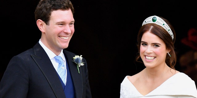 Jack Brooksbank and Princess Eugenie leave St. George's Chapel after their wedding ceremony on Oct. 12, 2018, in Windsor, England.