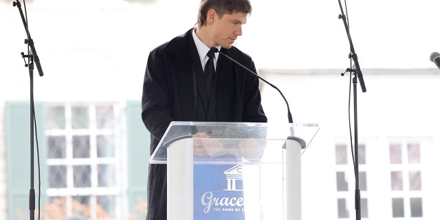 Ben Smith-Petersen read a tribute by Riley Keough, Lisa Marie Presley's daughter, at the public memorial for Lisa Marie Presley on Jan. 22, 2023, in Memphis, Tennessee.