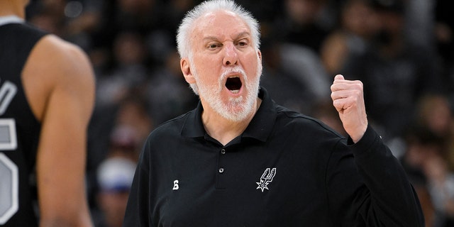 San Antonio Spurs head coach Gregg Popovich yells at a referee during the first half of an NBA basketball game against the New York Knicks, Thursday, Dec. 29, 2022, in San Antonio. 