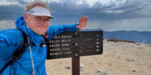 Cris Hazzard hiking Mount Baldy.