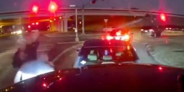 The suspect is then seen punching the victim.