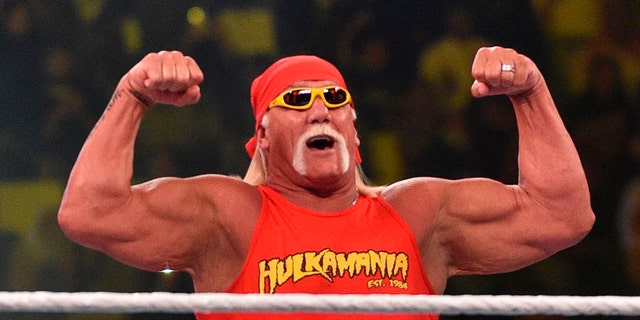 Wrestling legend Hulk Hogan greets the crowd during the World Wrestling Entertainment (WWE) Crown Jewel pay-per-view at the King Saud University Stadium in Riyadh on November 2, 2018.