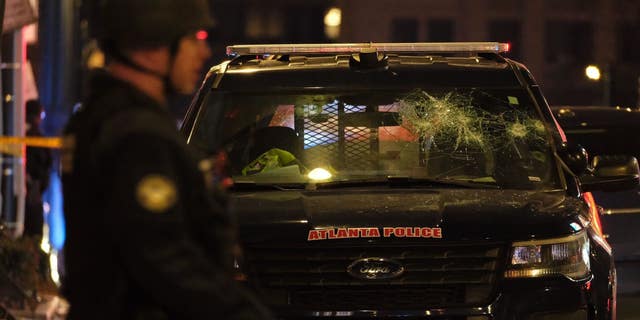 Cracked Atlanta Police Department SUV amid violent protests on Saturday, January 21.
