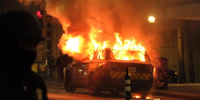 Burning Atlanta Police Department SUV during weekend protests.  Georgia Gov.  Brian Kemp issues a state of emergency in anticipation of more unrested this weekend. 