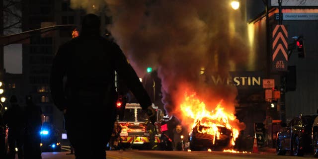 Atlanta police work urgently to clear the streets of protesters on Saturday, January 21.