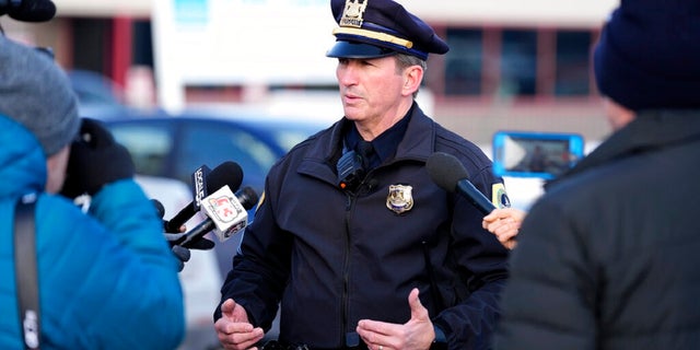 Des Moines Police spokesman Sgt. Paul Parizek speaks outside the Starts Right Here building.