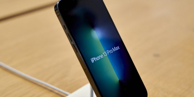 An Apple iPhone 13 Pro smartphone in the green color during the sales launch at the Apple Inc.  Flagship store in New York, US, on Friday, March 18, 2022. 