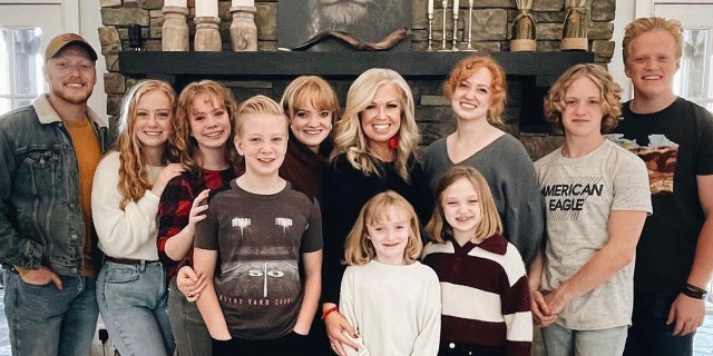 US soldier finds dog she rescued overseas 2 Elizabeth Johnston (centre) is pictured with her children. She and her family, she told Fox News Digital, are visiting Dallas, Texas this weekend — where Roe v. Wade was decided 50 years ago.